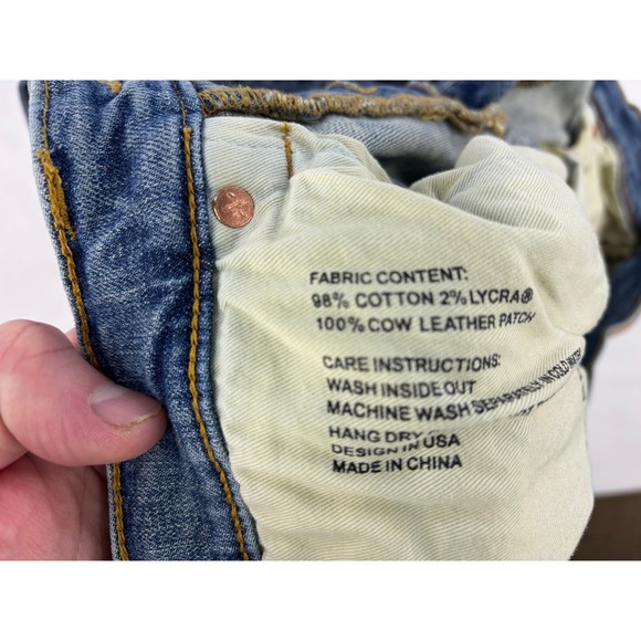 Purple Brand P002 - Worn Mid Indigo Destroy size 32